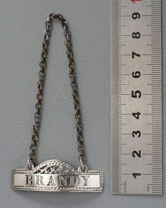 Hester Bateman Silver Domed Rectangle Brandy Wine Label